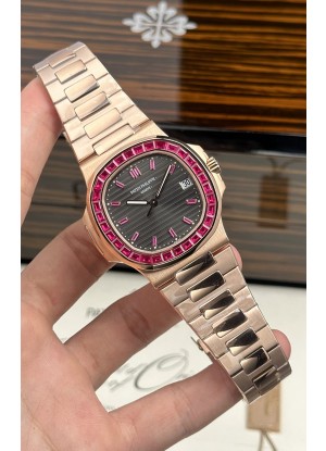 Reloj Patek Philippe Nautilus 5723 de oro rosa con rubíes rojos, superclon