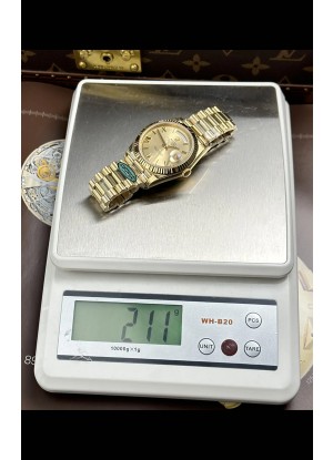 Reloj Rolex Day Date 228238 de oro amarillo con esfera romana dorada, superclon