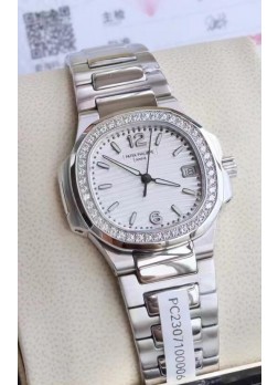 Patek Philippe Nautilus 7010/1G-011 32MM Réplica Espejo 1:1 - Bisel con Diamantes Genuinos